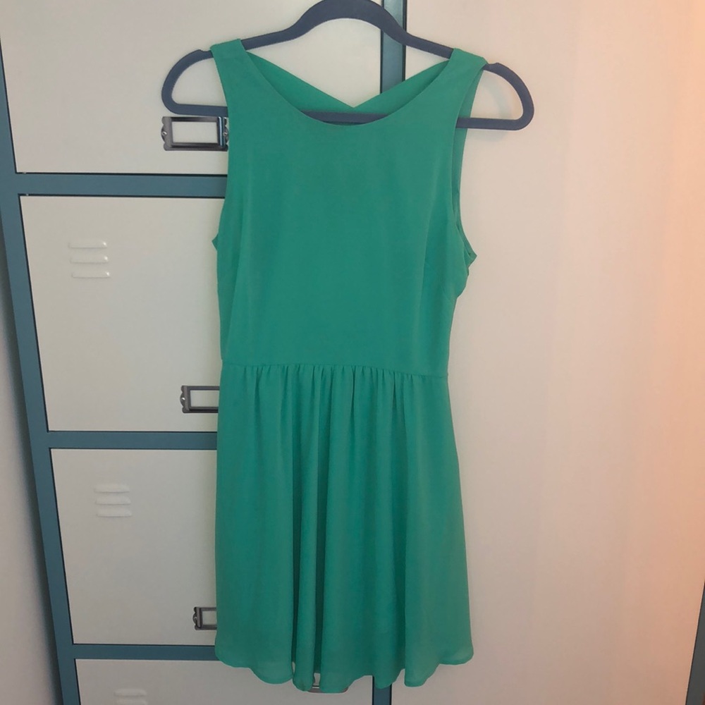 Seafoam green dress with crossing detail in back